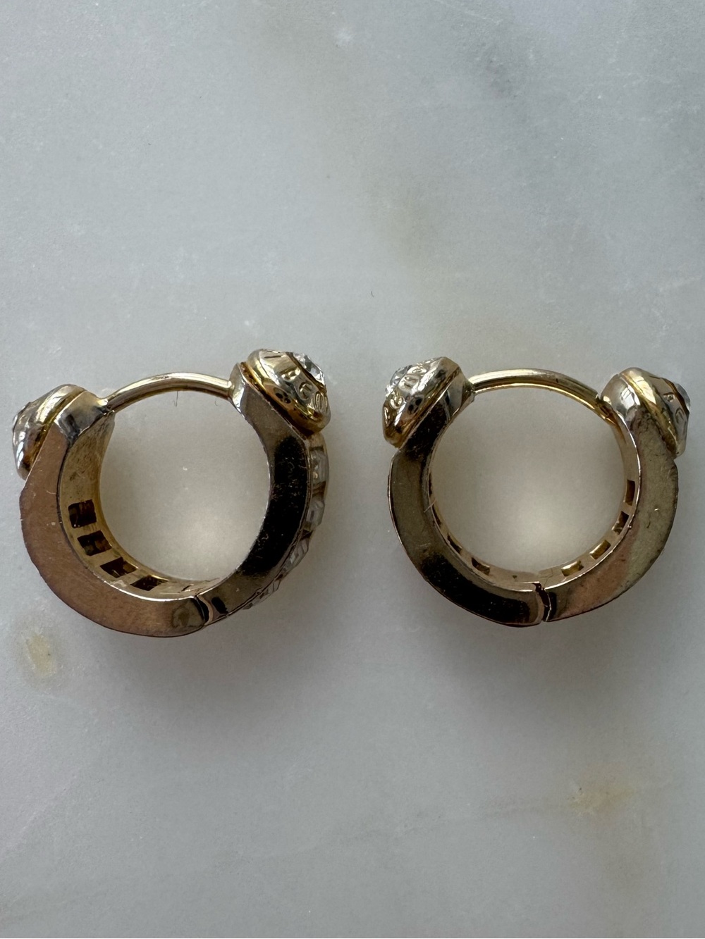 Henri Bendel Gold-Tone Crystal Huggie Hoop earrings.